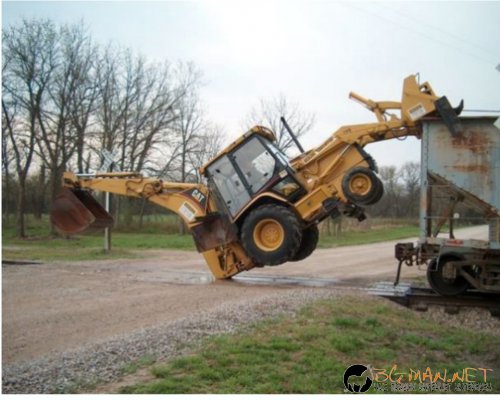 Как да качим багер във вагон?